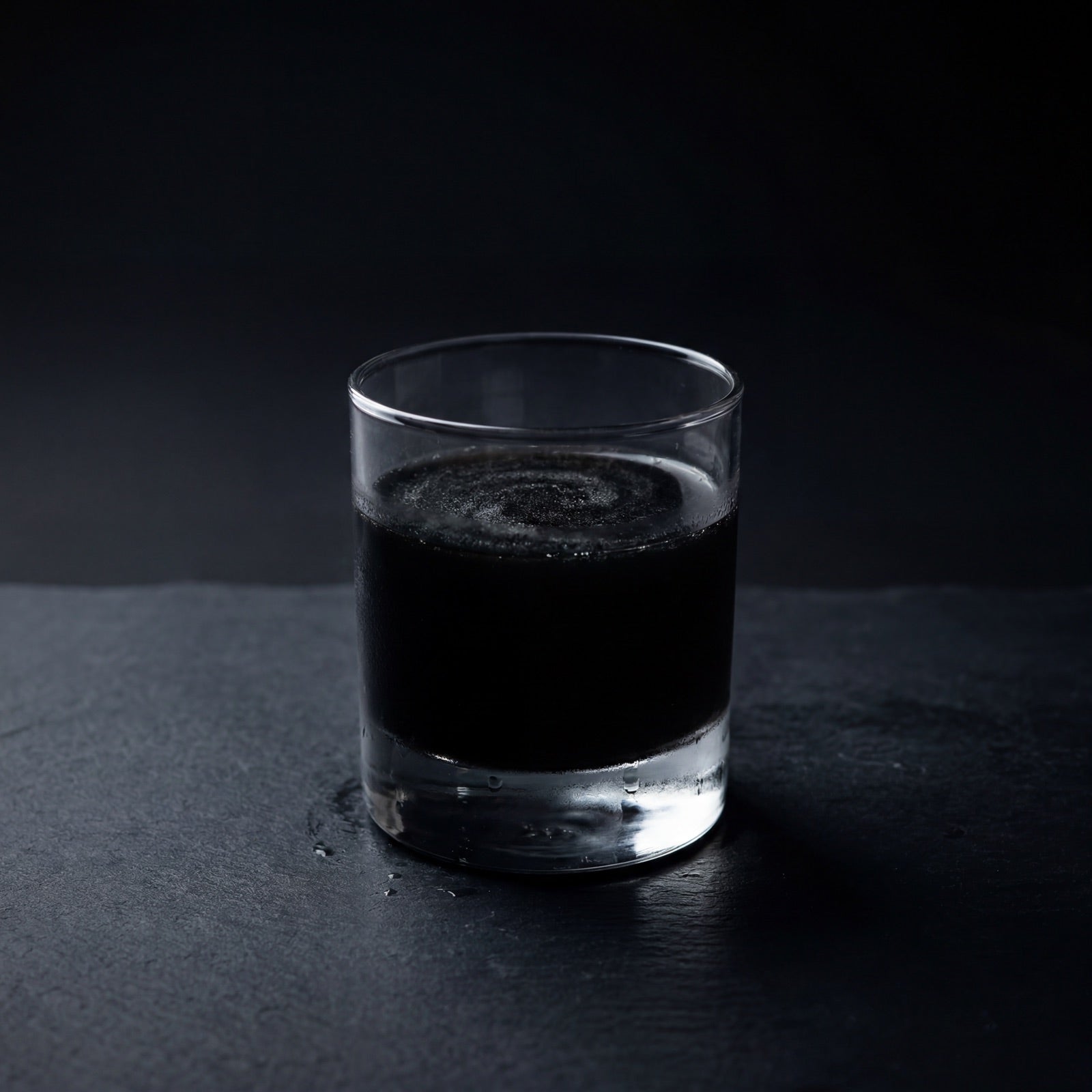 A glass of the SWORN Discipline Drink Mix